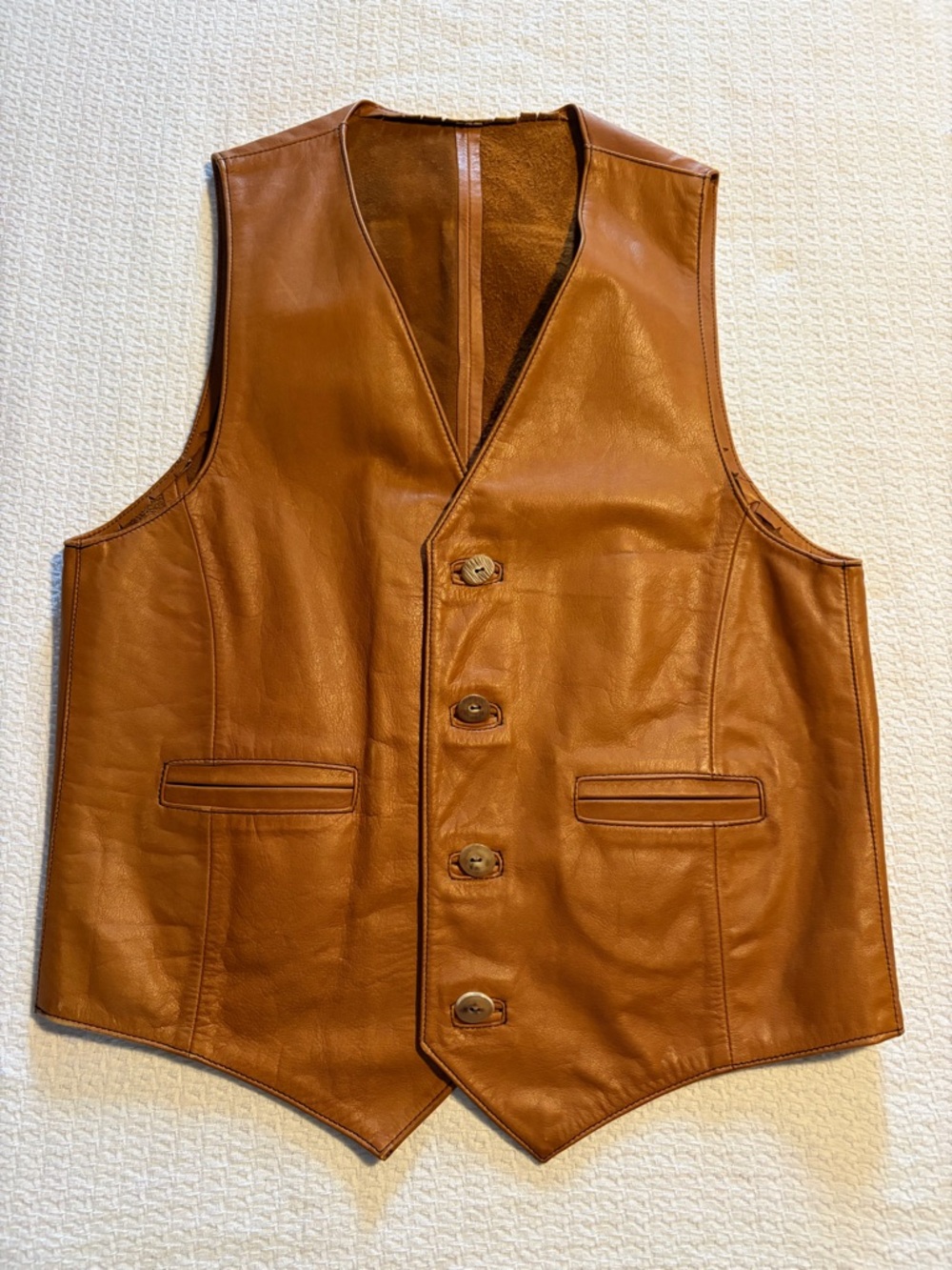 Men’s handmade tan leather vest, circa 1970s